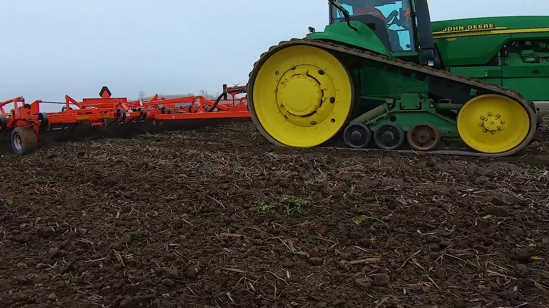 Agricultural equipment operating in a field, from SplashVP's reel